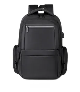Front view of black business backpack with waterproof fabric and multi-pocket structure
