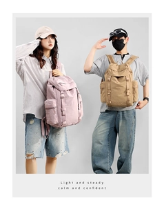 Outdoor 25L nylon backpack detail showing lavender and sand colors on models