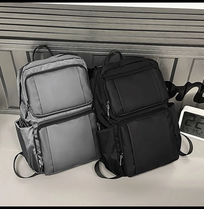 Dual front zipper pockets on high-density waterproof nylon business backpack