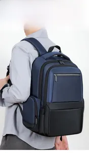 Men's large capacity business backpack in navy blue shown from a side-rear perspective