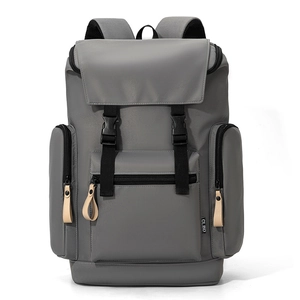 Front view of grey minimalist backpack with dual black buckles and large capacity main compartment