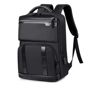 Detail view of business travel backpack with USB charging port and multi-layer zipper pockets