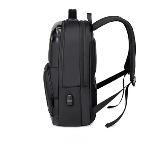 Side view of multi-layer business backpack with USB port and padded handle details