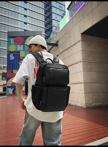 Detail view of the multi-layer structure and durable nylon material of the black backpack