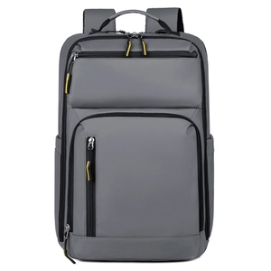 Vue frontale d'un sac à dos d'affaires gris foncé imperméable aux détails jaunes