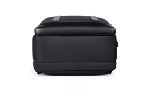 Detailed bottom view of expandable business backpack with waterproof leather reinforcement