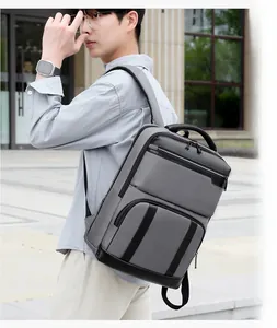 Close-up of expanded waterproof business backpack showing premium texture and large capacity