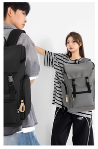 Front view of large capacity nylon backpacks in black and dark grey with buckle design