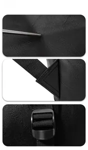 Detail of litchi grain leather texture and reinforced triangular stitching on black backpack