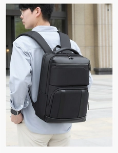 Ergonomic breathable mesh straps on a large black business laptop backpack