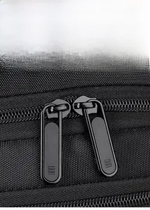 Detail of matte black alloy double zippers on the durable nylon business backpack