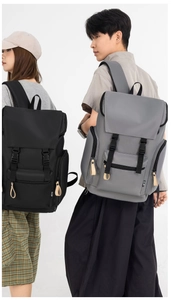 Detail view of large capacity casual backpacks with buckle closure and zipper pockets