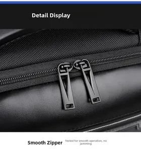 Macro shot of smooth matte black double zippers on high-density business backpack fabric