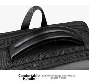 Detail of the dual padded handle on a black business travel backpack for comfort
