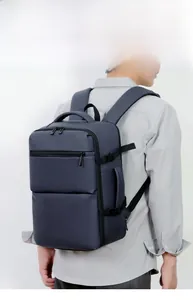 Deep blue professional laptop backpack with water-resistant matte finish and side handles