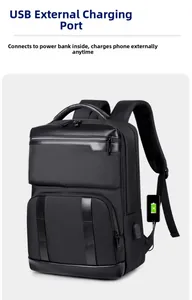 Detail showing the external USB charging port on a black waterproof business laptop backpack