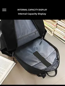 Detail of laptop backpack interior with gray lining and velcro strap compartment