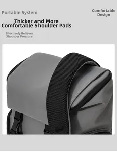 Detail of gray backpack featuring thick padded mesh shoulder straps for pressure relief