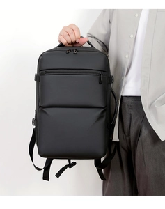 Detail of waterproof black business backpack with reinforced side and top handles