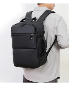 Detail of waterproof business backpack showing side handle and durable plastic buckles