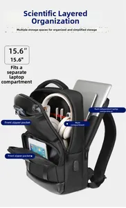 Detail of expandable business backpack showing 15.6 inch laptop compartment and USB port