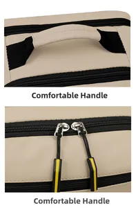 Détail de la poignée ergonomique et de la double fermeture éclair du sac à dos beige