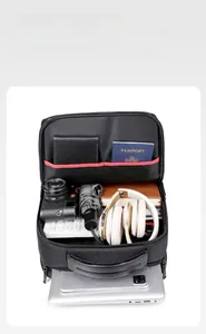 Internal view of a large business travel backpack with organized compartments for electronics