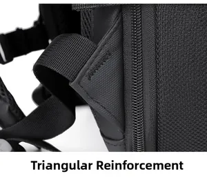 Detail of triangular reinforcement stitching on durable black nylon laptop backpack straps