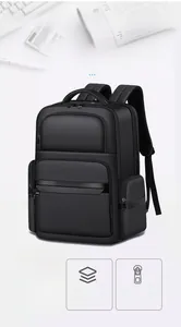 Detail of black business backpack featuring laptop compartment and water-resistant fabric