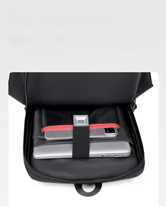 Macro shot of internal compartment with laptop sleeve and red elastic security straps