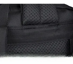 Close-up of reinforced stitching and breathable mesh fabric on durable travel backpack