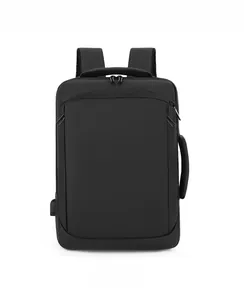 Detail of black business laptop backpack showing the built-in USB charging port and side handle