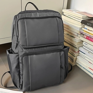 Deep grey business laptop backpack with multiple zipper pockets for students and travel