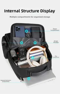 Internal compartments of the black Oxford commuter backpack showing laptop and gear storage