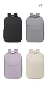 Four modern travel backpacks in black, grey, purple, and beige with waterproof fabric
