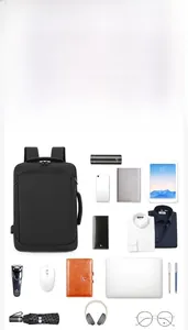 Detailed flat lay of large capacity business backpack with organized laptop storage space