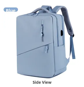 Detail view of light blue laptop backpack showing USB charging port and mesh straps