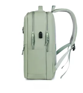 Side view of mint green water-resistant laptop backpack with USB charging port
