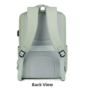Detail view of the ergonomic breathable mesh back and luggage strap on this green laptop bag