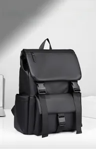 Detail view of the sleek black backpack with buckle closure and matte finish texture