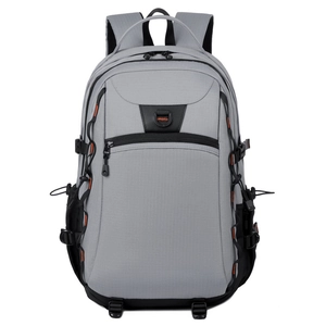 Front view of grey large capacity travel backpack with orange stitching and D-rings