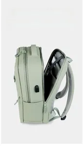 Detail view of the shockproof laptop compartment with thick padding in a green backpack