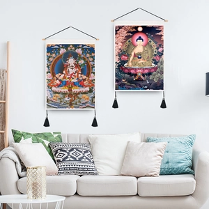 Thangka style Buddha wall art scroll with wooden rod and black decorative tassels
