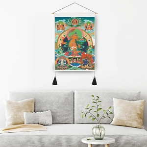 Buddhist Thangka wall scroll painting with black tassels in a modern living room decor