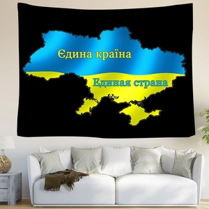Detail of Ukraine map tapestry showing blue and yellow flag colors over a white sofa