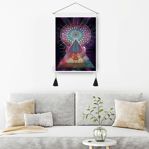 Vertical wall tapestry with abstract purple mandala art and wooden rod in modern living room