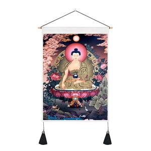 Detail of Buddha wall art with pink lotus throne, wood scroll and black silk tassels