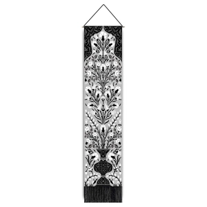 Minimalist black and white floral canvas tapestry with bottom tassels and hanging rod