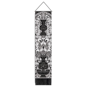 Minimalist monochrome floral scroll painting with black tassels for living room wall art