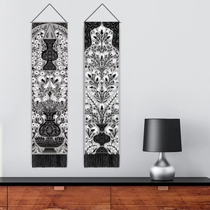 Symmetric floral vase tapestry set with black fringe and ropes for wall decoration